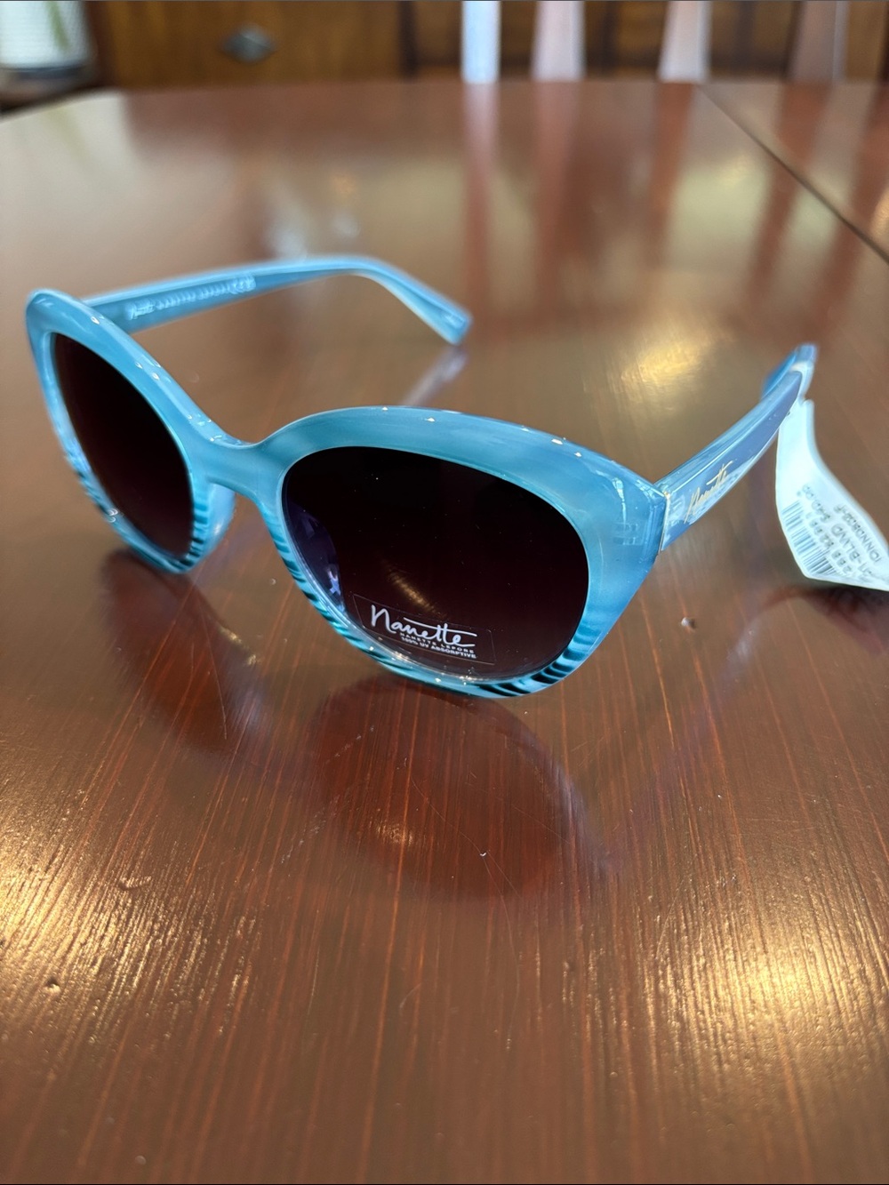 Nanette Lepore 100% UV protection tortoise shell  at eye,gradient lens,logo arm